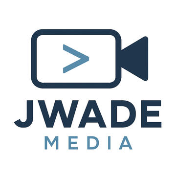 JWade Media Logo Logo for JWade Media featuring a stylized dark blue video camera icon with a light blue greater-than symbol inside the lens area. Below the icon, the text ‘JWADE’ appears in bold dark blue capital letters, with the word ‘MEDIA’ in smaller light blue capita